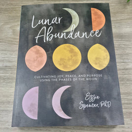 Lunar Abundance: Cultivating Joy, Peace, and Purpose Using the Phases of the Moon Paperback – by Ezzie Spencer PhD (Author)